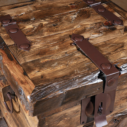 Top view showing iron strap hinges on rustic reclaimed wood trunk accent table