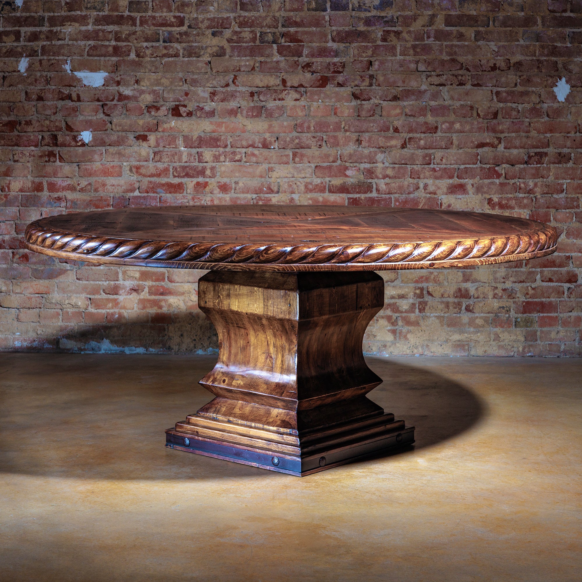 Western-style reclaimed wood dining table in rustic interior setting