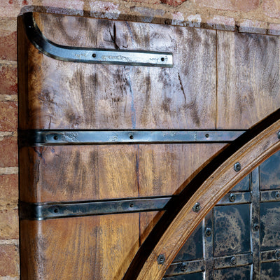 Detail of hand-forged iron and mango wood headboard