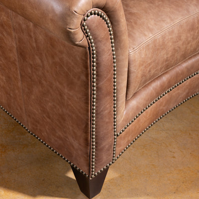 Rolled arm and nailhead trim closeup on Oakley Frontier saddle tan leather chair