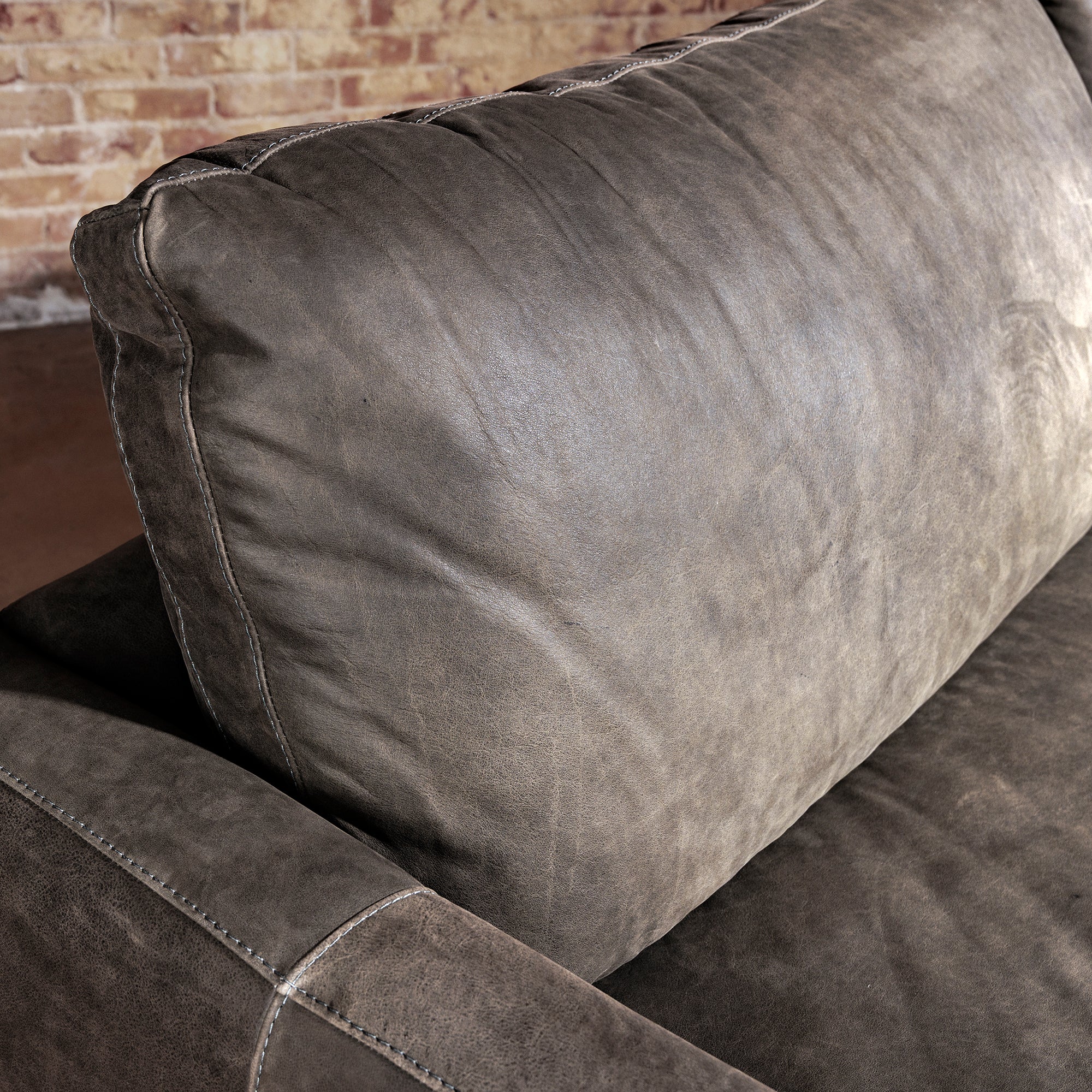 One-only Remington Cowhide Sofa & Swivel Chair Set in top-grain leather. Retail value $12,098, special bundle price $7,999. First come, first served.