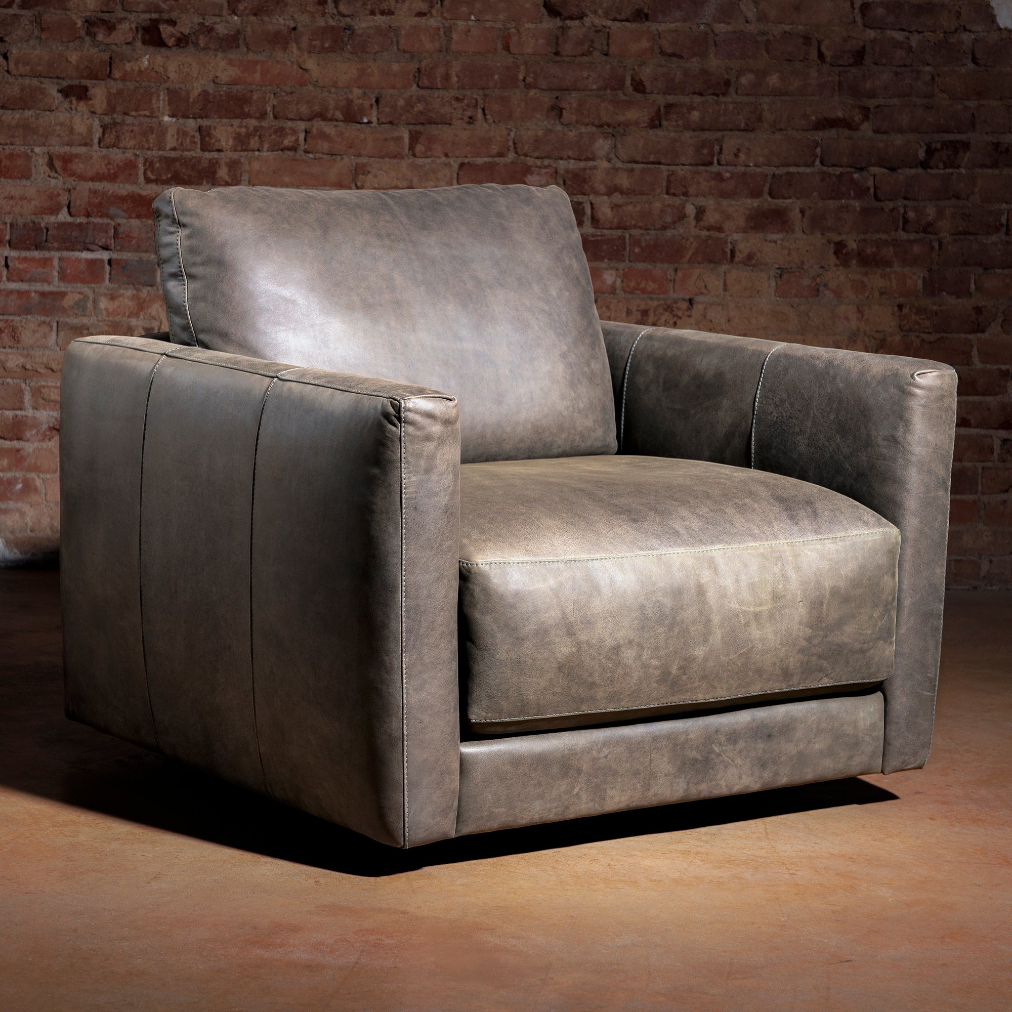 upscale transitional leather swivel chair