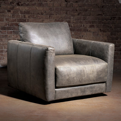 One-only Remington Cowhide Sofa & Swivel Chair Set in top-grain leather. Retail value $12,098, special bundle price $7,999. First come, first served.