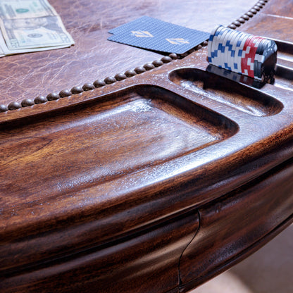Leather inlay and chip slots on The Outlaw’s Round Poker Table