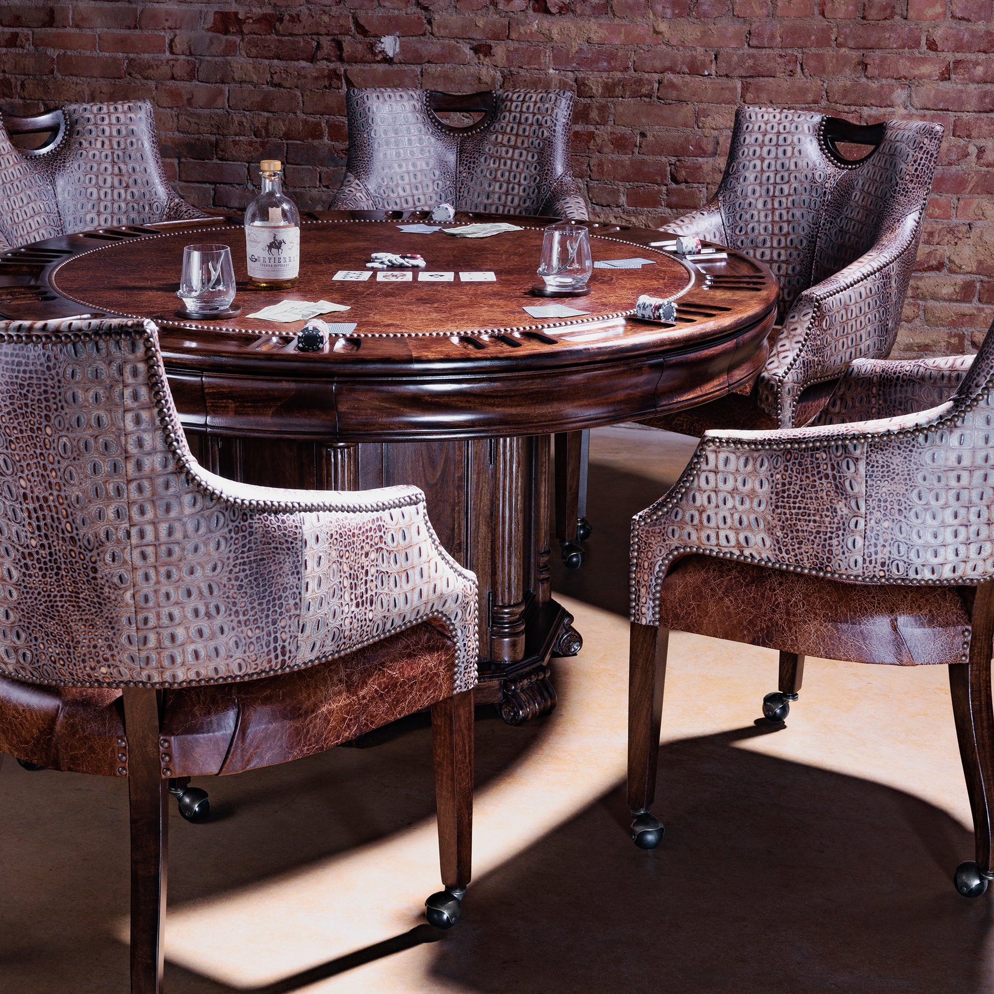 The Gambler’s Mark Western Poker Chair in embossed top-grain croc leather with poker table