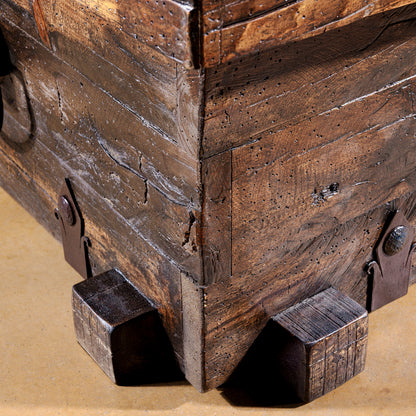 Close-up corner detail of reclaimed wood texture on Outpost Timberlock Trunk Table