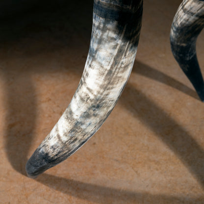 Detail of curved horn leg with natural striations on Western horn-leg side table