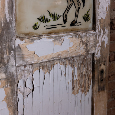 Palo Pinto Rodeo Relic Western Art Door Panel western decor close-up with cracked paint, aged wood texture, and timeworn lower panels