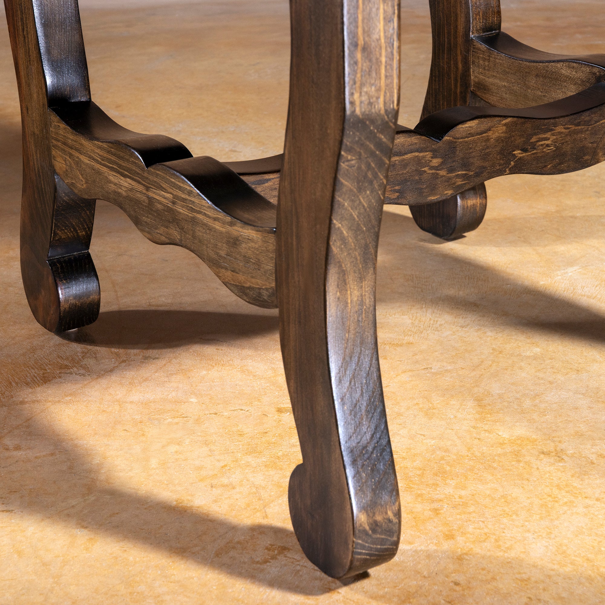 Carved wood cabriole legs and stretcher detail on Pecos Canyon ranch style dining chair