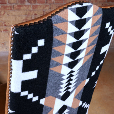 Close-up of Pendleton® wool fabric and nailhead trim