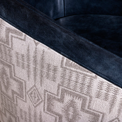 Close-up of leather arm and Pendleton fabric on the Silver Mesa Swivel Chair