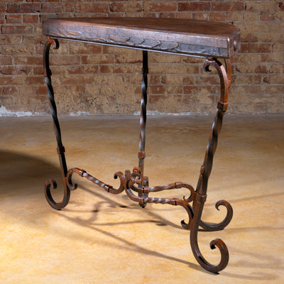 Side angle view of narrow wood and iron Ranchero Scroll Forge Western accent table