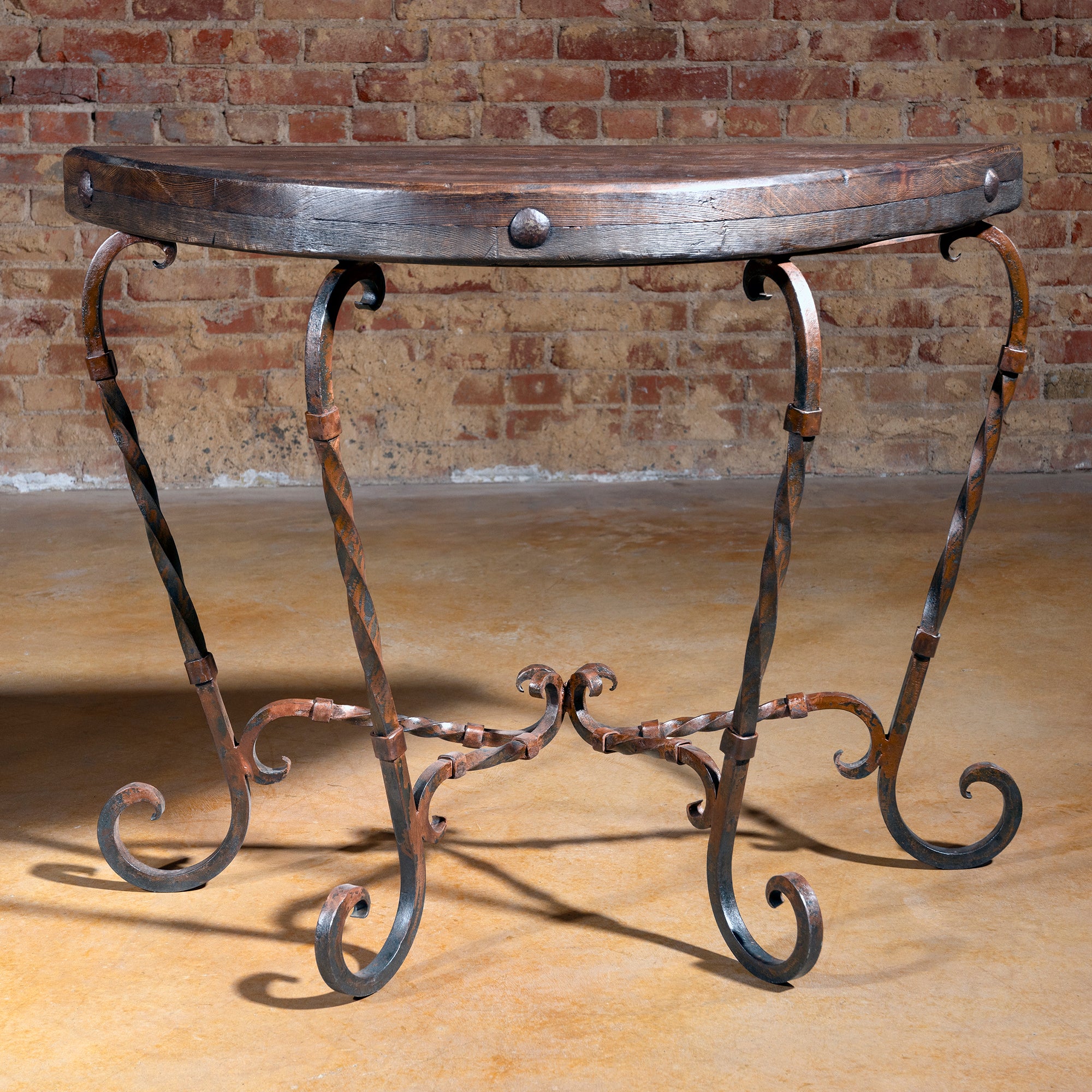 Ranchero Scroll Forge Console Table with rustic wood top and twisted forged-iron base front view