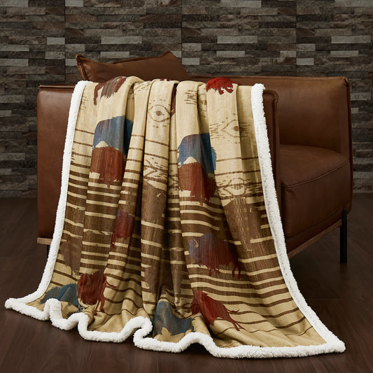 Bring the spirit of the West into any space with the Range Campfire Sherpa Throw. This lightweight blanket features a majestic buffalo herd and Aztec patterns in earthy and sky-inspired colors, and is finished with a cozy sherpa reverse for ultimate warmth and comfort. Easy-to-care-for materials make this throw an ideal, budget-friendly addition to any home.