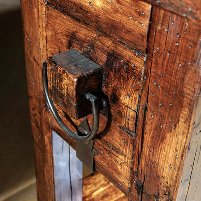 Forged iron handle detail on reclaimed wood Western-style console