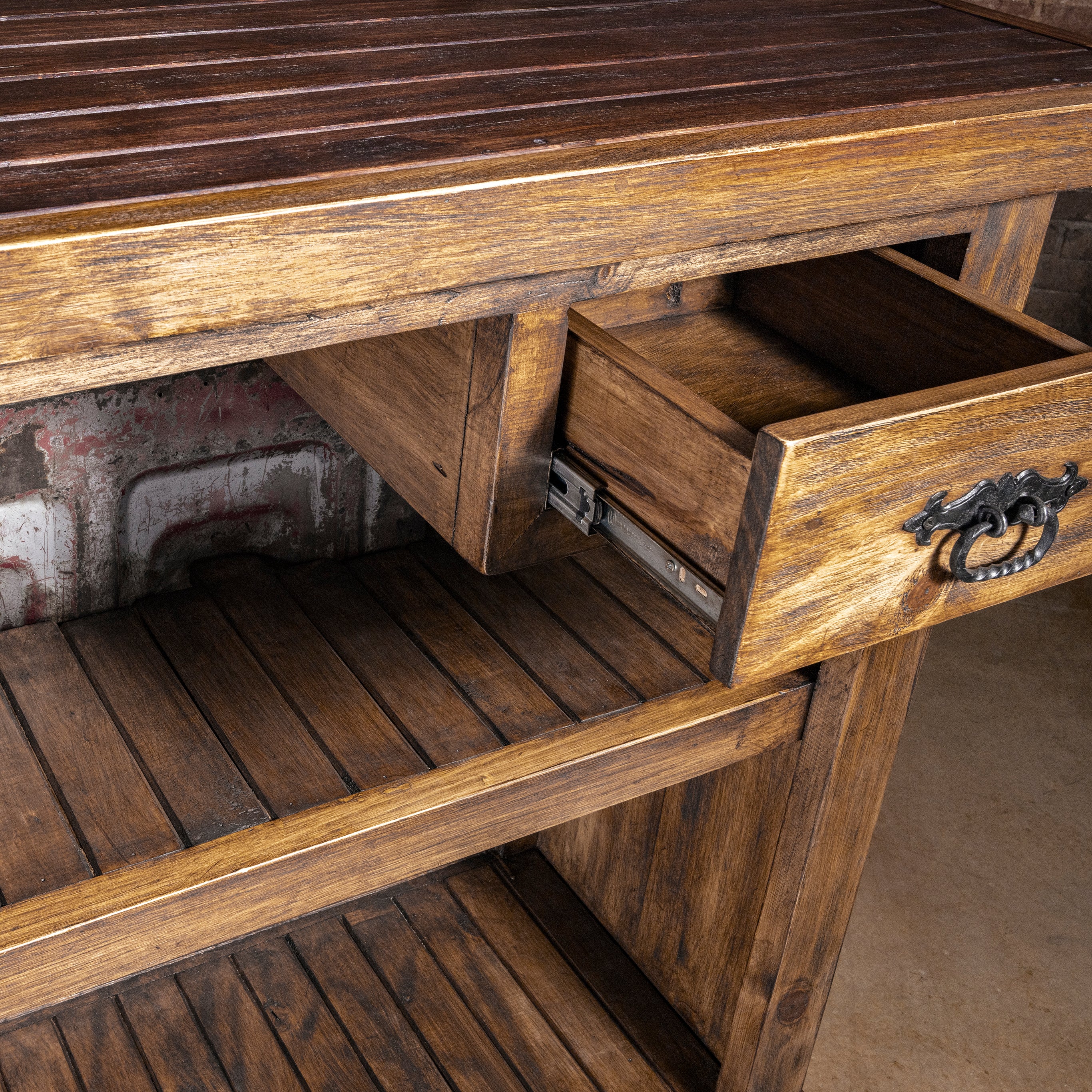 Redstone Bullhorn Tailgate Western Bar Cabinet western bar with utility drawer, iron ring pull, and slatted reclaimed wood shelving