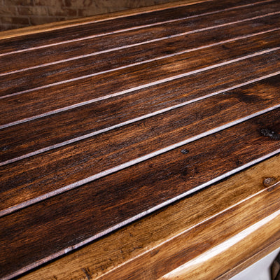 Redstone Bullhorn Tailgate Western Bar Cabinet western bar with utility drawer, iron ring pull, and slatted reclaimed wood shelving