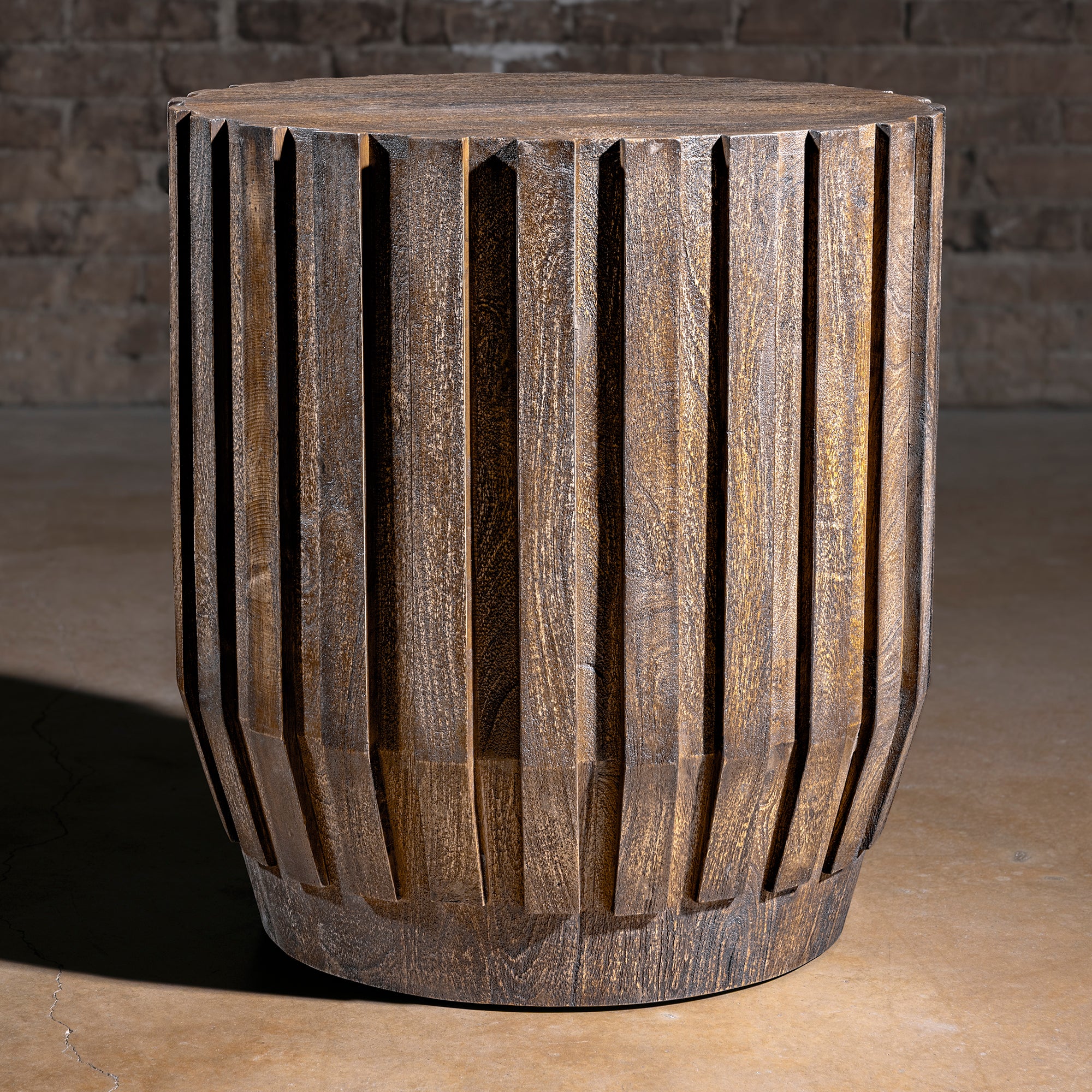 Ridgeline Drum Table western accent table with round wood form, carved fluted sides, weathered finish, and rustic ranch presence
