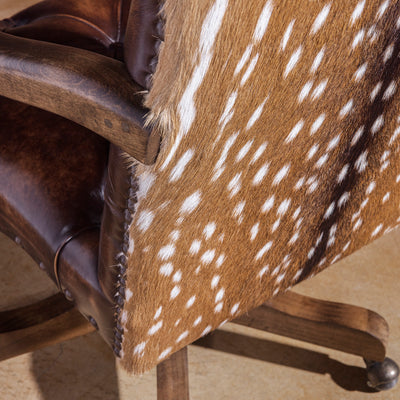 Axis hide close-up on Western leather desk chair back panel