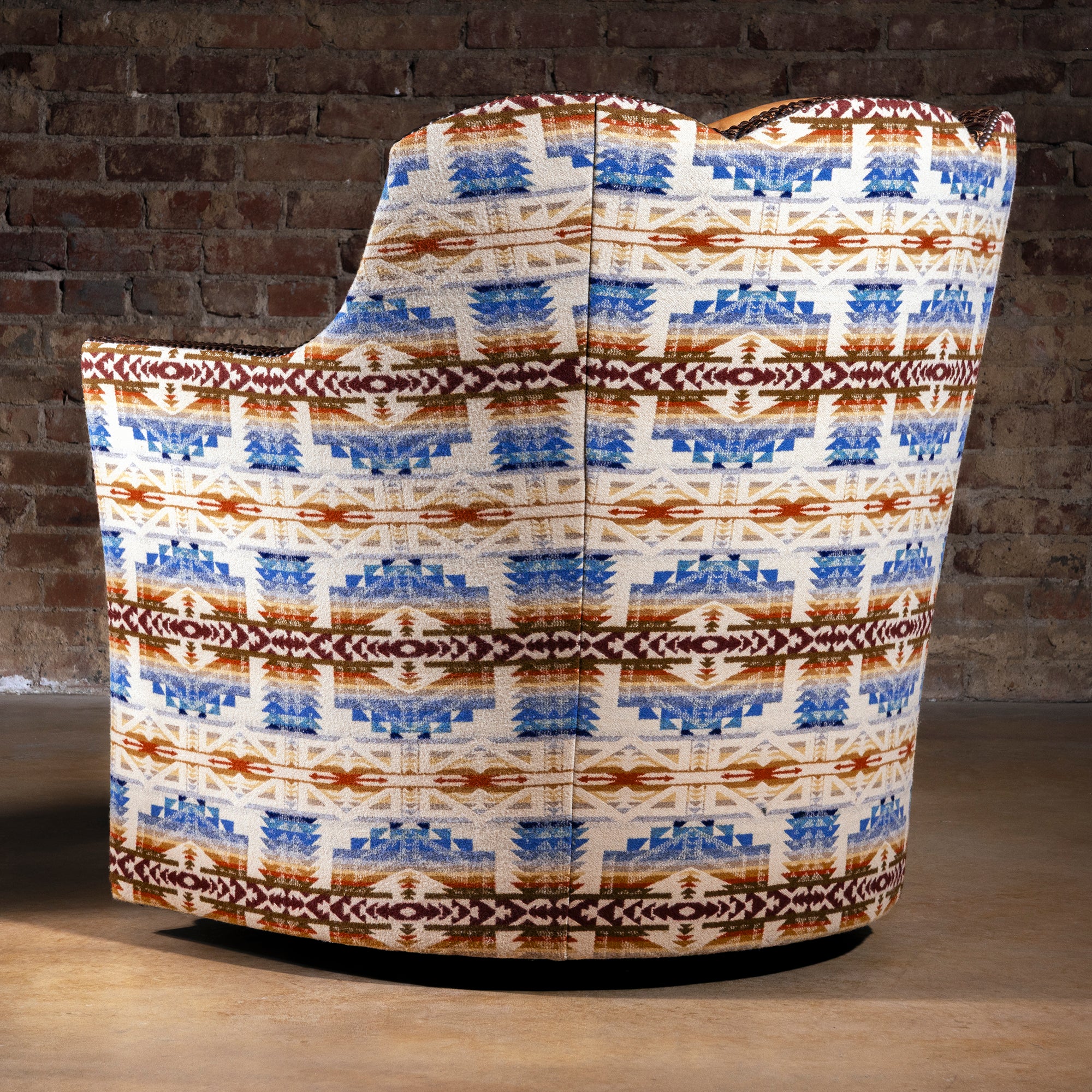 Back of Rio Sol Pendleton Swivel Chair showing blue and rust Pendleton pattern