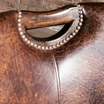 Carved wood handle detail on leather game chair for easy pull-up seating