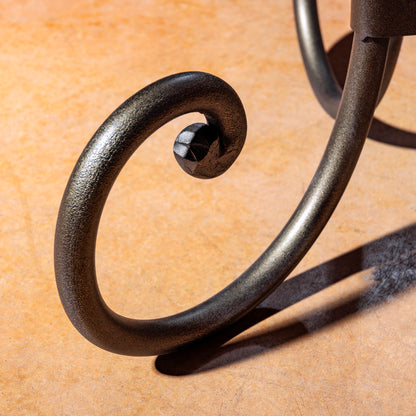 Scroll-forged Iron Leg Detail on the Durango Flame Copper Accent Table