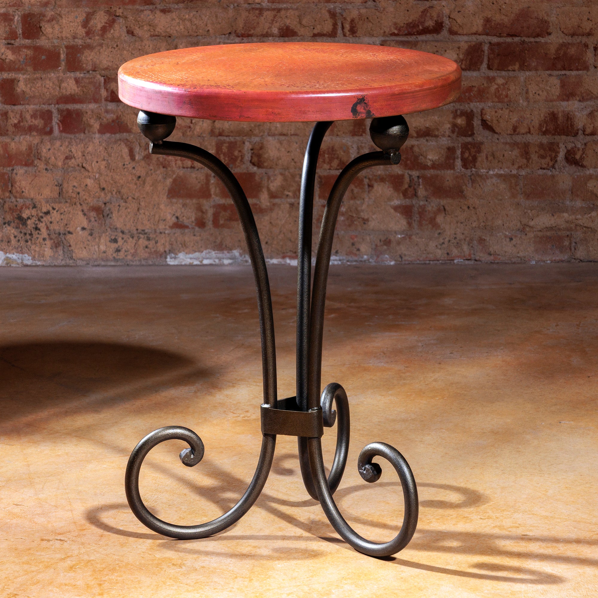 The Durango Flame Copper Accent Table – Hero Shot with Scroll Iron Legs and Patinated Copper Top