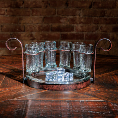 Shot glass tray filled with ice for serving