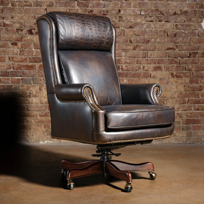 High back Western leather executive desk chair with croc-embossed headrest, antique nailheads, and wood caster base.