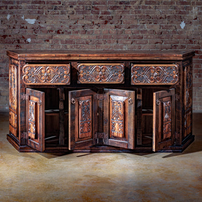 Interior view of San Miguel Western buffet with carved cabinet doors open
