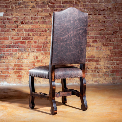 Rear view of high-back Western dining chair with full cowhide panel