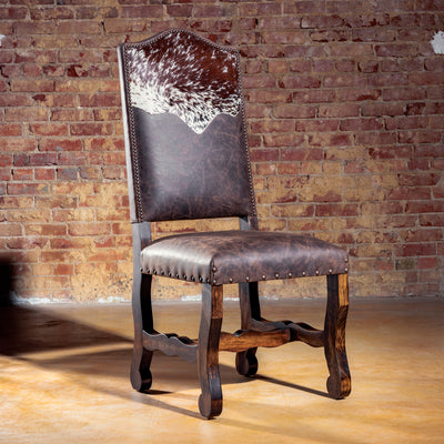 Front view of the San Rafael cowhide and leather Western dining chair