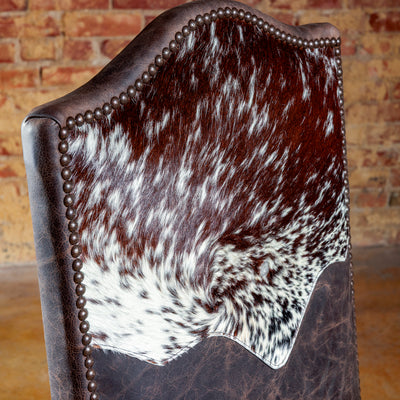 Close-up of Brazilian cowhide and nailhead trim on backrest