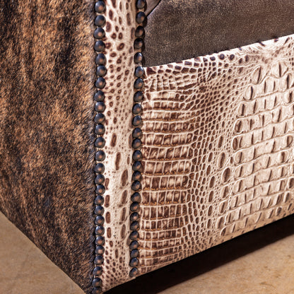Bottom detail of San Saba Bootstitch Swivel Chair showing craftsmanship and base finish
