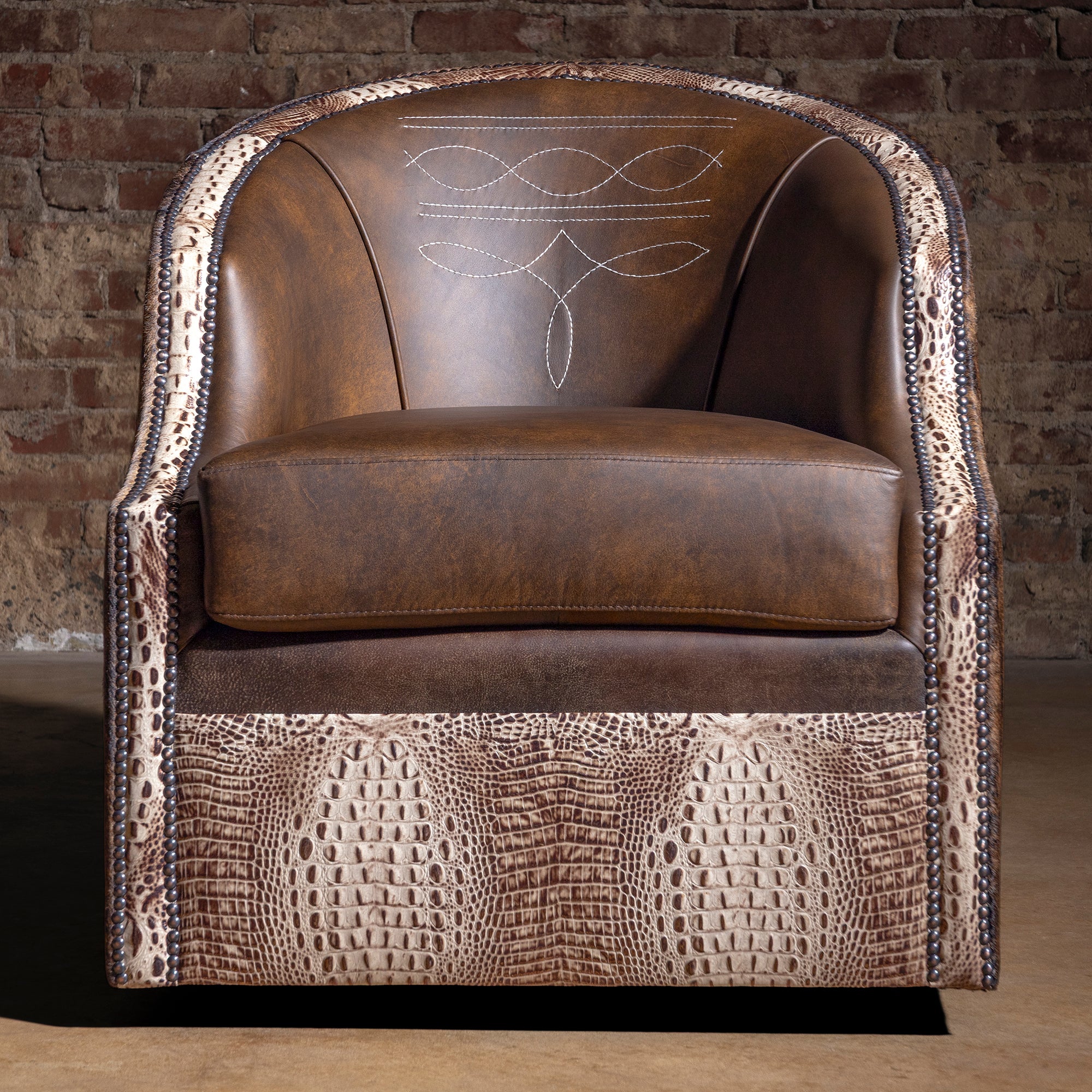 Front view of San Saba Bootstitch Swivel Chair with boot-stitch detail and cowhide exterior