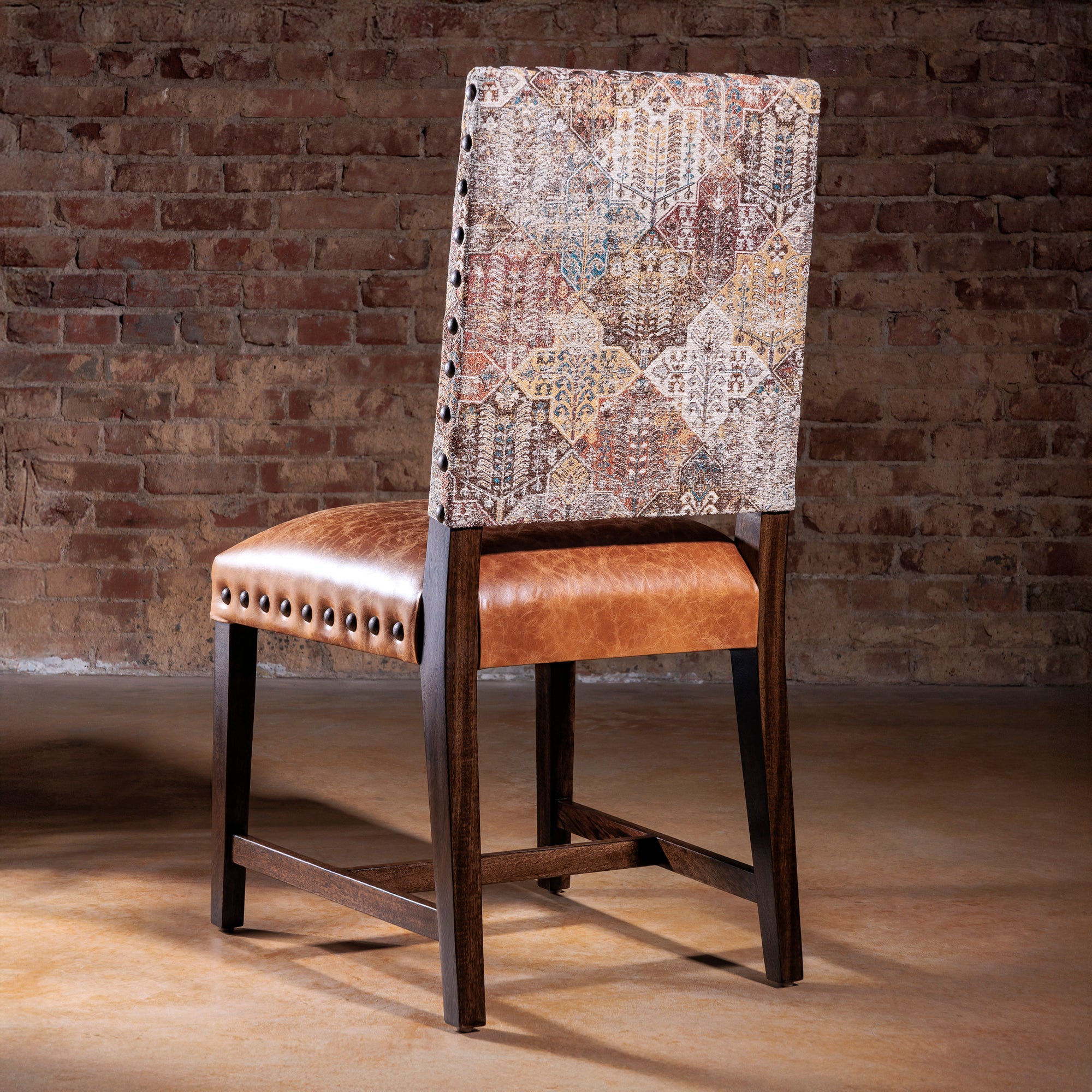 Rear view of Western-style dining chair with designer tapestry fabric