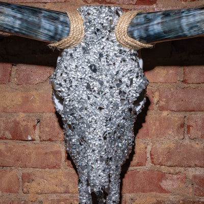 Close-up of silver glass texture and rope accent on decorative Western skull mount