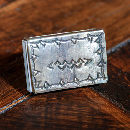Stamped pattern on the back of the silver turquoise matchbox holder