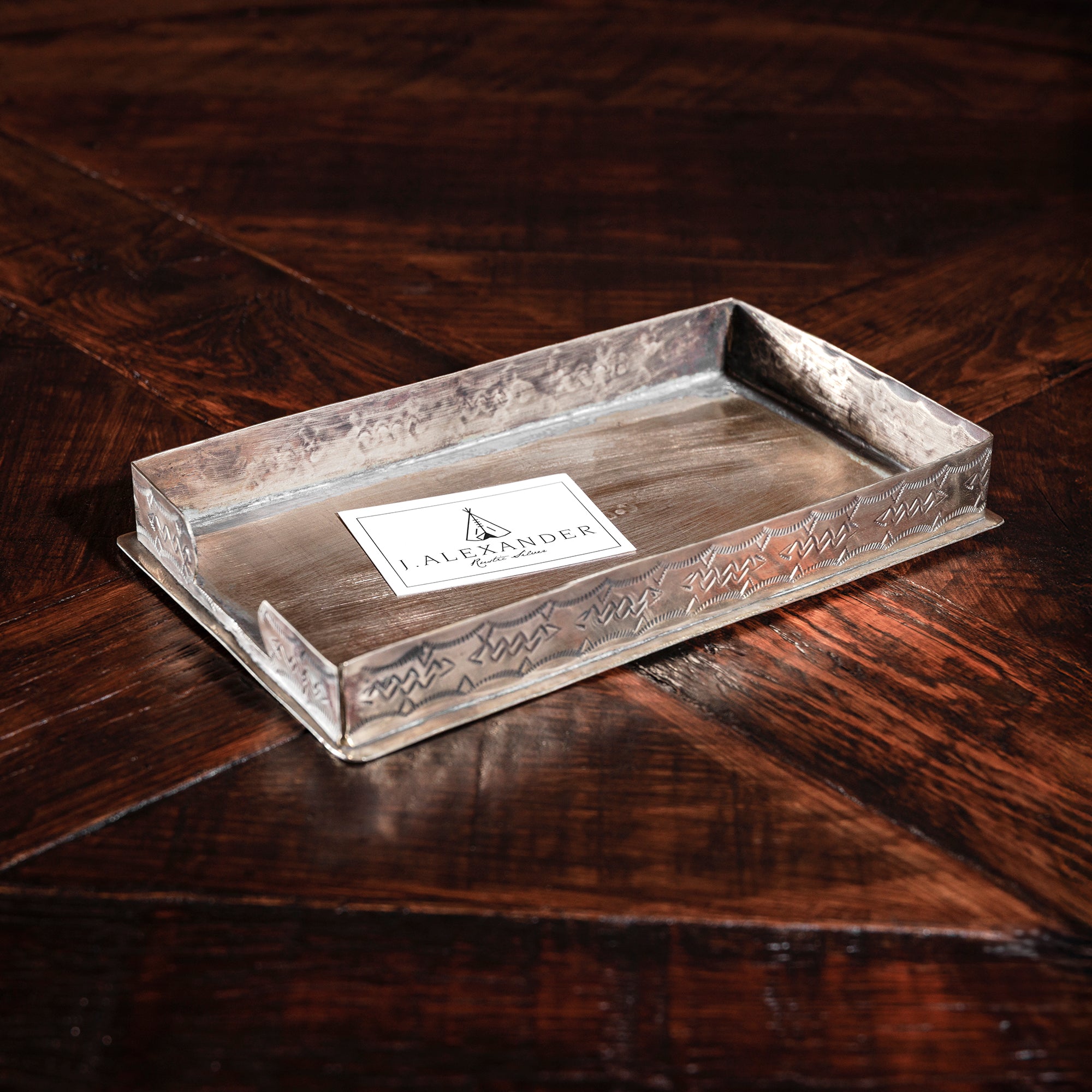 Hand-tooled silver napkin tray by J. Alexander with stamped detailing