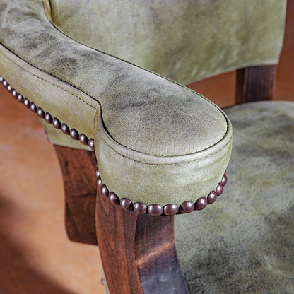 Green leather arm with artisan nailhead trim on Sonora Verde Western bar stool