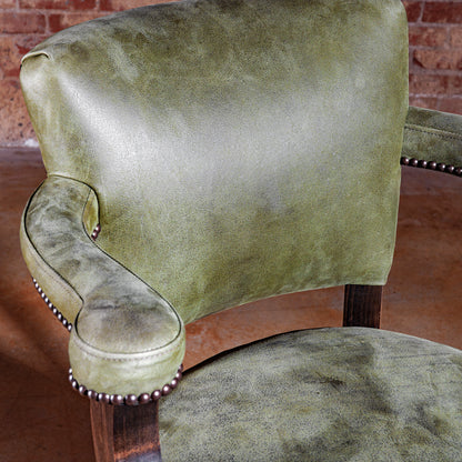 Close-up on sage-green leather backrest—Sonora Verde