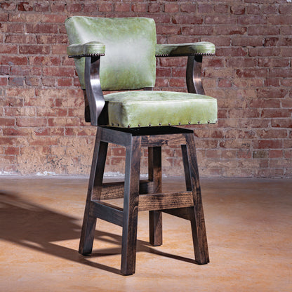 Luxury Western bar stool in sage-green leather with boot-stitch embroidery and alder wood base—Sonora Verde