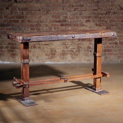 Spur Line Iron Console Table at three quarter angle showcasing reclaimed wood top and Western iron base