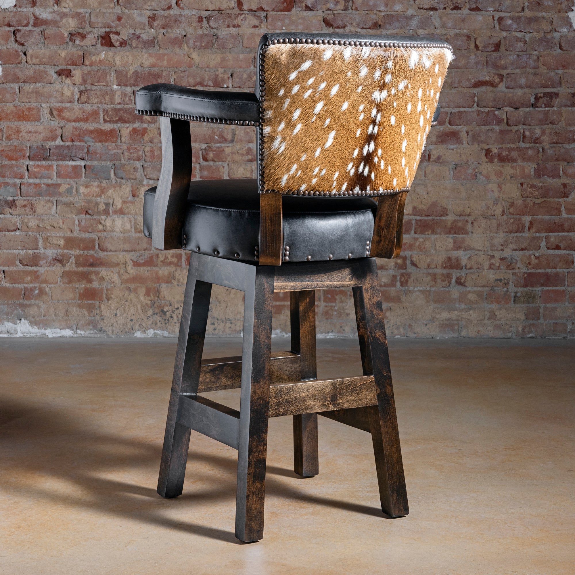 Stallion Grove Bar Stool western axis hide bar stool back view with natural axis hide outer back, nailhead trim, and finished alderwood frame