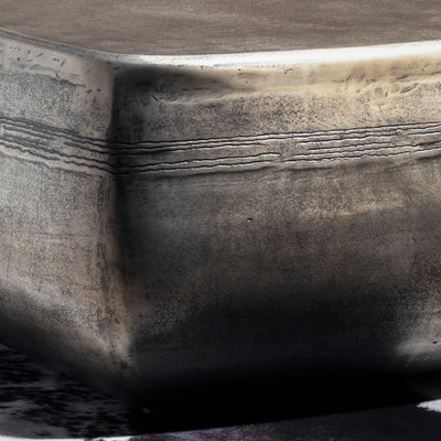 Sterling Range Forge Low Western Metal Coffee Table western coffee table with a low sculptural form, softened corners, and silver finish.