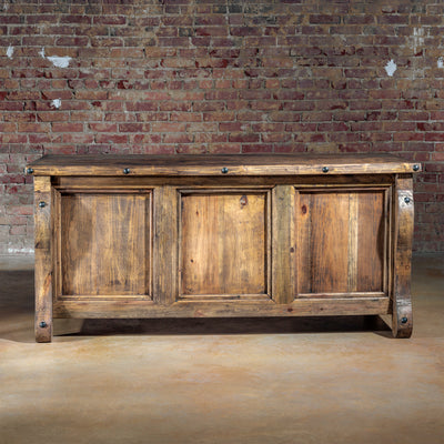 Front angle of The Telluride Executive Desk with serpentine legs and paneled front