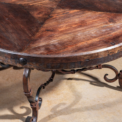 Distressed reclaimed wood tabletop with iron trim accent – Into The West