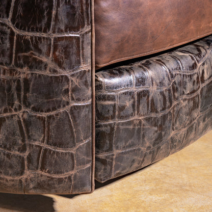 Recliner footrest showing croc hide upholstery – Into The West