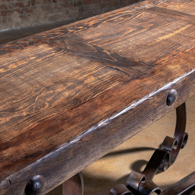 Distressed reclaimed wood top with rivet edge detailing – Into The West
