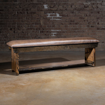 Tularosa Saddle Bench western bench with brown top-grain leather seat, dark wood base, and lower storage shelf